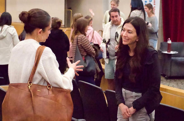 Laura with a student