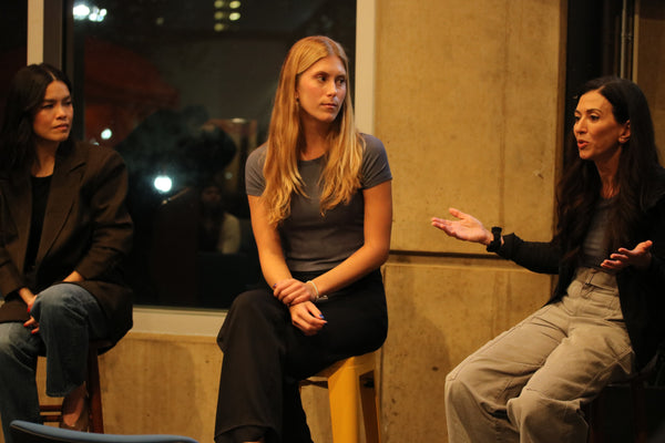 Laura speaking with students